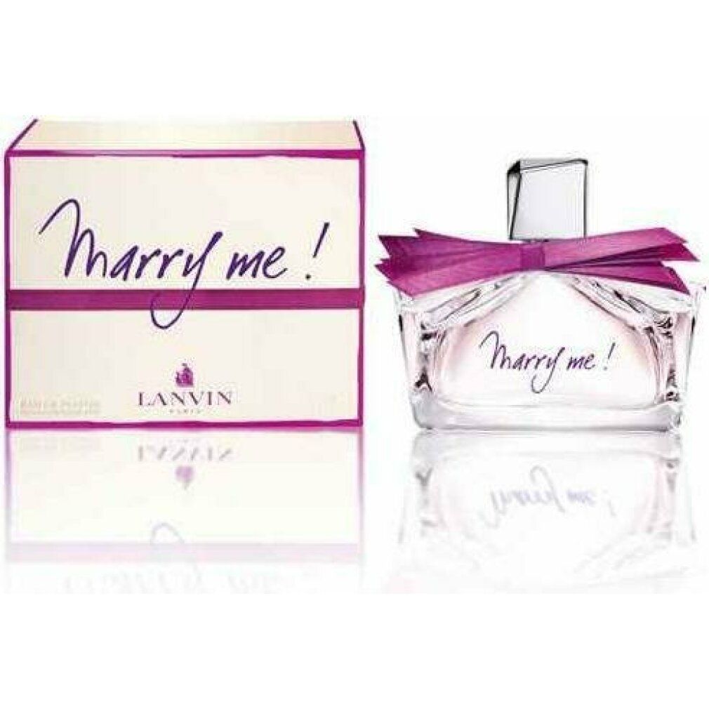 Flacone di profumo e scatola. Flacone con fiocco e scritta. Scatola con scritta.