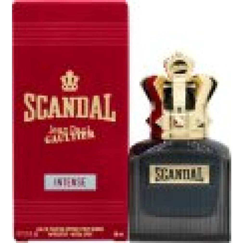 Flacone blu scuro e confezione rossa. Flacone con tappo a corona dorata. Scritta "SCANDAL".