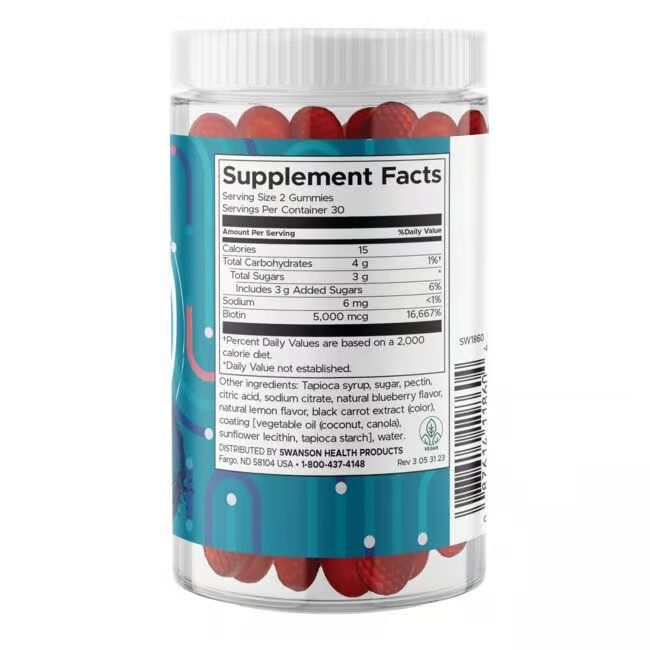 Retro del barattolo SWANSON Biotin. Informazioni nutrizionali e lista ingredienti su etichetta bianca. Vegano e senza glutine.