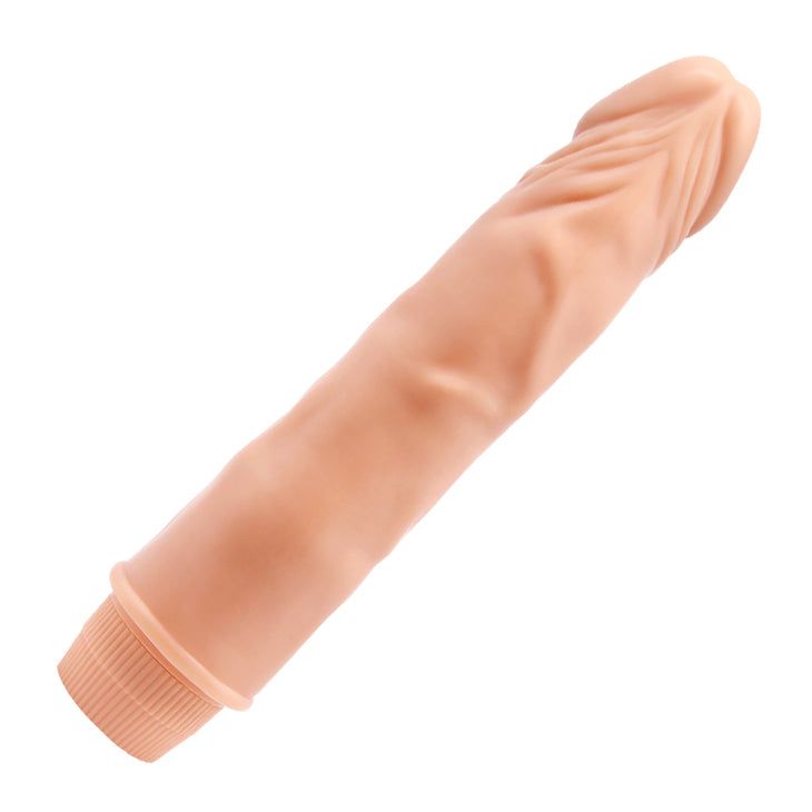 Dildo realistico beige con superficie strutturata. Base con texture scanalata.