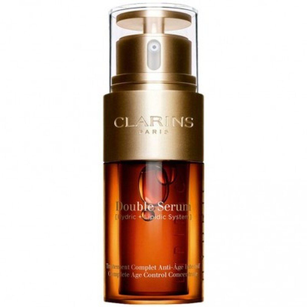 Flacone Clarins Double Serum. Tappo dorato, flacone trasparente con liquido marrone.