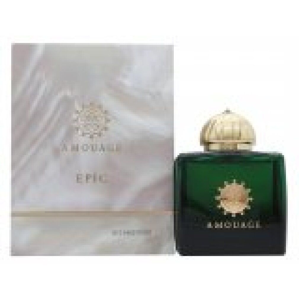 Profumo verde accanto a una confezione. Scritta AMOUAGE EPIC. Logo e dettagli dorati.