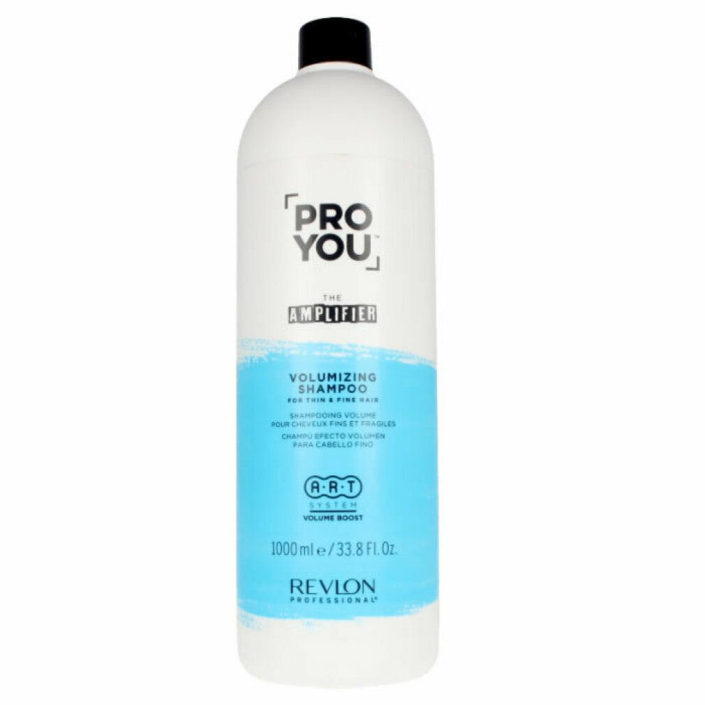 Flacone bianco, tappo nero. Scritta: Pro You The Amplifier Volumizing Shampoo. Etichette blu e bianche. Revlon Professional.