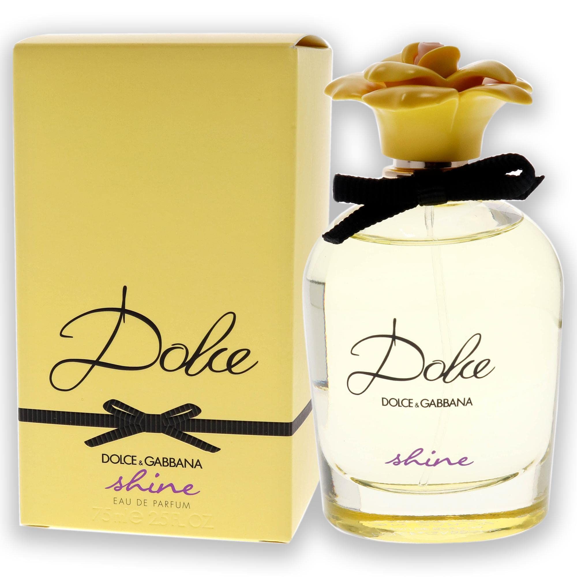 Flacone di profumo e confezione. Confezione gialla con fiocco nero e scritta "Dolce & Gabbana Dolce shine".