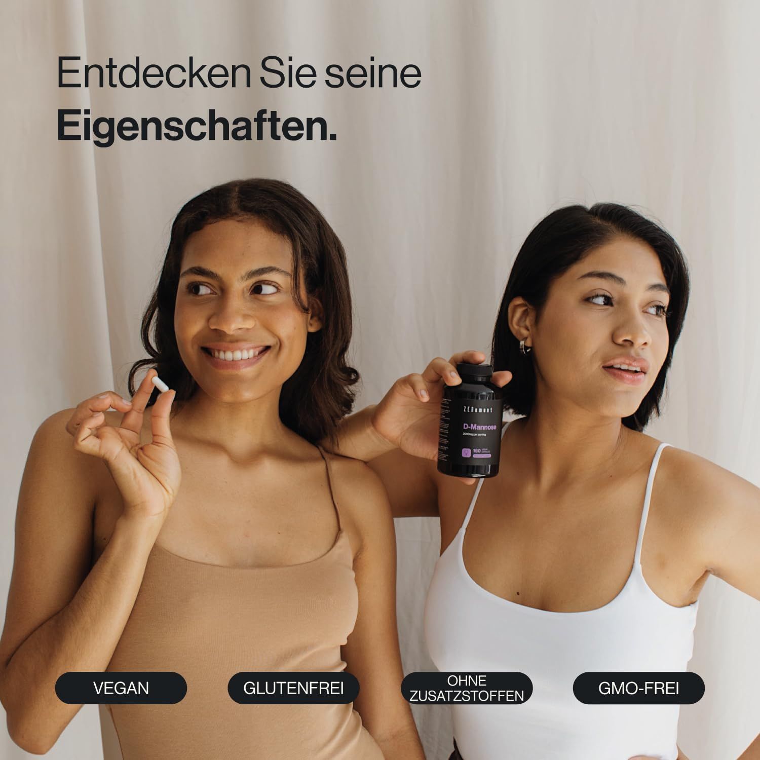 Due donne con una capsula e un flacone. Il flacone indica Zenement D-Mannose. Vegano, senza glutine, senza additivi, senza OGM.