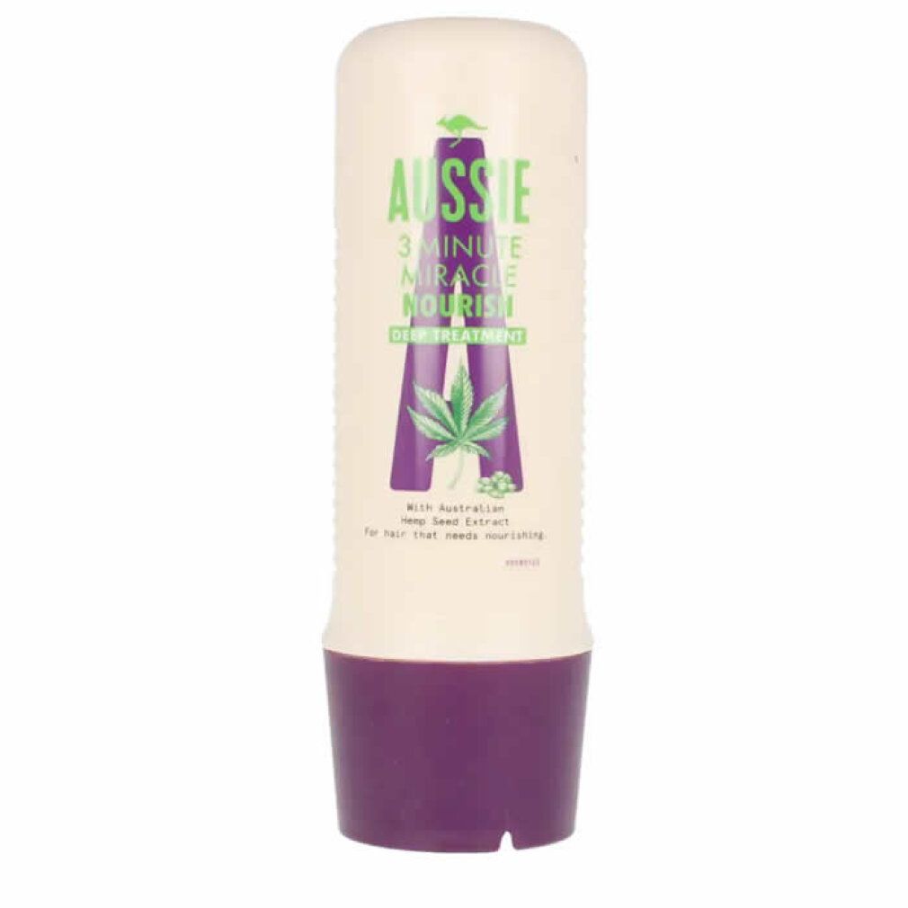 Tubo beige con base viola. Scritta: Aussie 3 Minute Miracle Nourish Deep Treatment. Con estratto di semi di canapa.