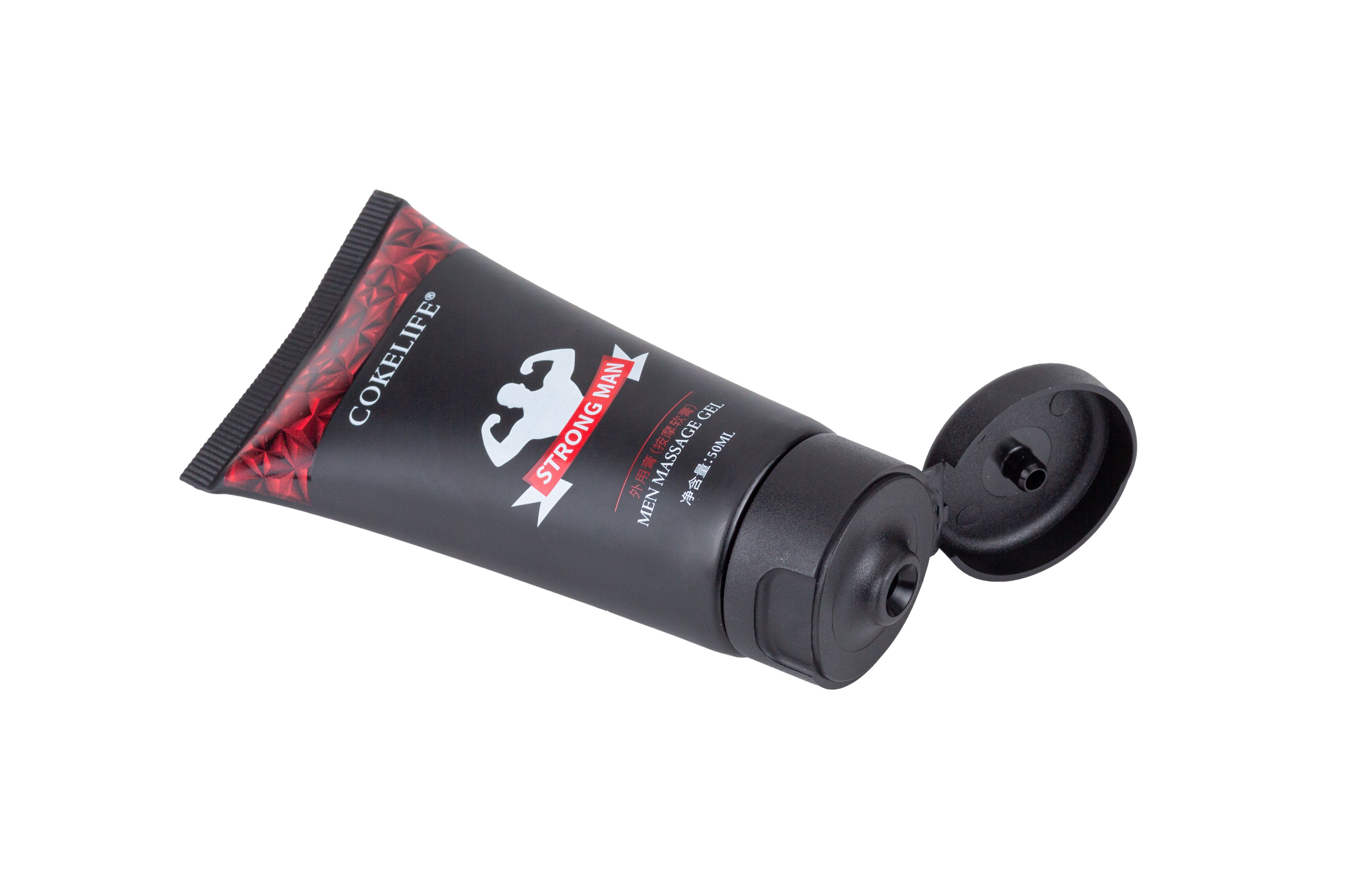 Tubo nero con stampa rossa e tappo nero. Scritta: COKELIFE STRONG MAN.