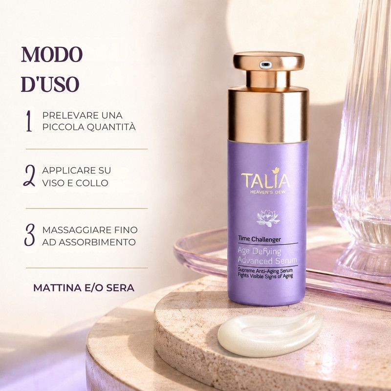 Flacone viola con pompa dorata, etichettato 'Talia Heaven's Dew Time Challenger Age Defying Advanced Serum'.
