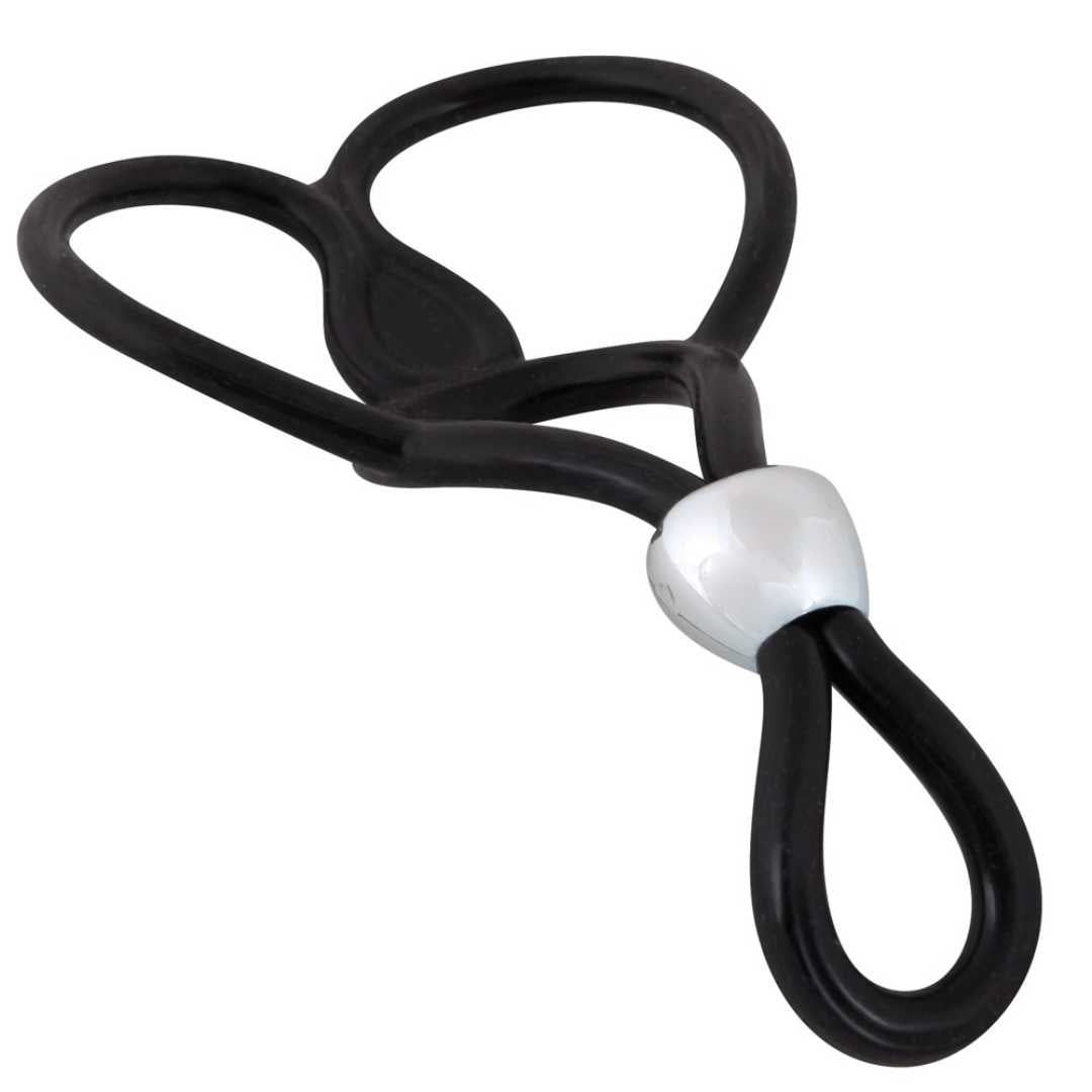 Anello fallico nero con anello scrotale. Elemento di collegamento argentato. Elementi ad anello.