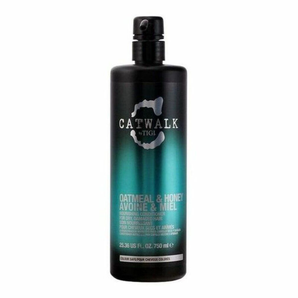 Flacone nero di balsamo. Scritta: CATWALK by TIGI, OATMEAL & HONEY. 750 ml. Per capelli secchi e danneggiati.
