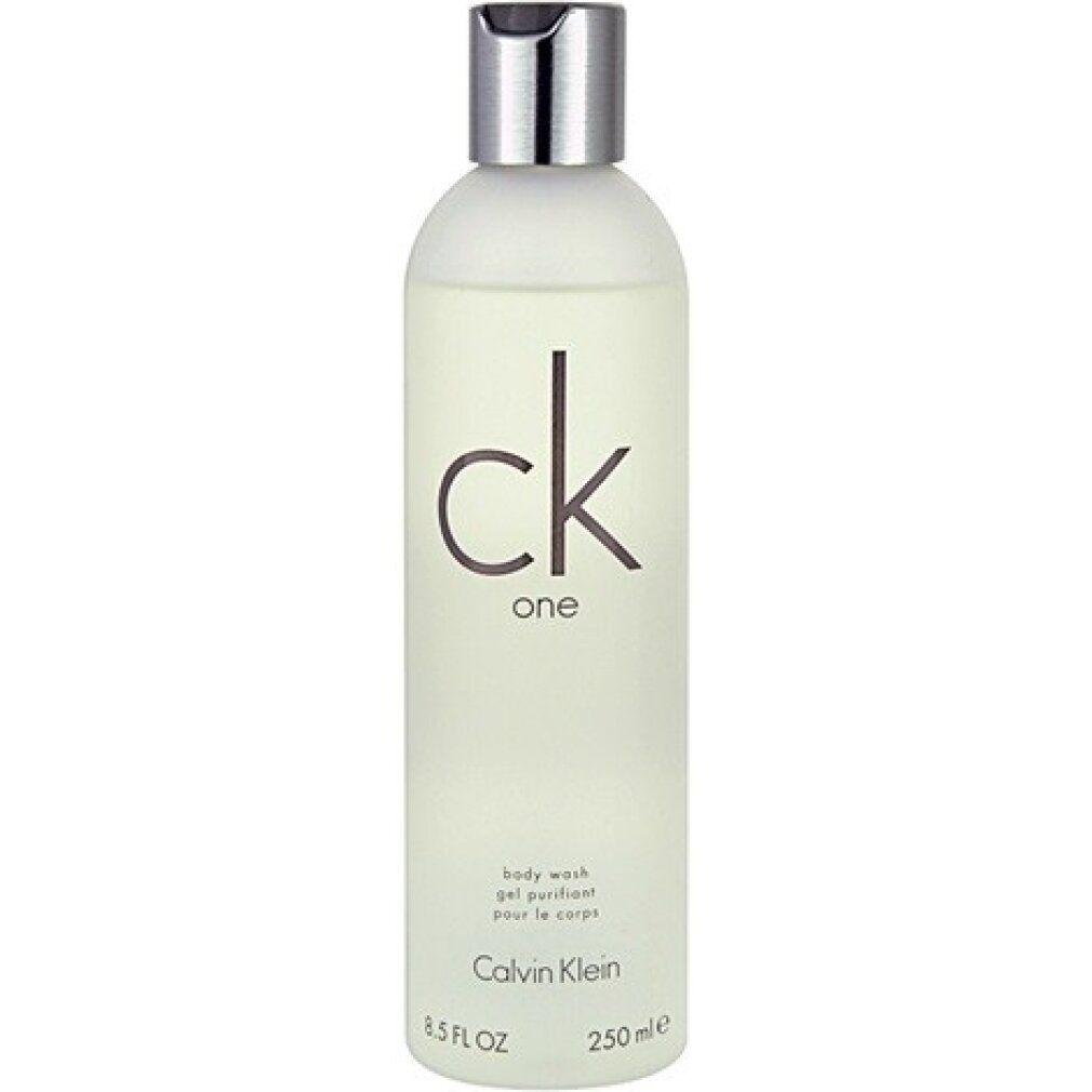 Flacone di bagnoschiuma con tappo argentato. Scritta "ck one" e "Calvin Klein".