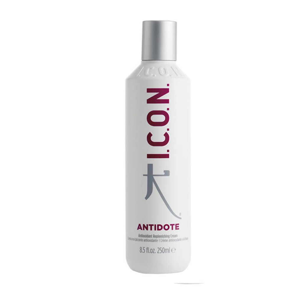 Flacone bianco con tappo argentato. Scritta: I.C.O.N. Antidote Antioxidant Replenishing Cream. Scritta e logo rossi.