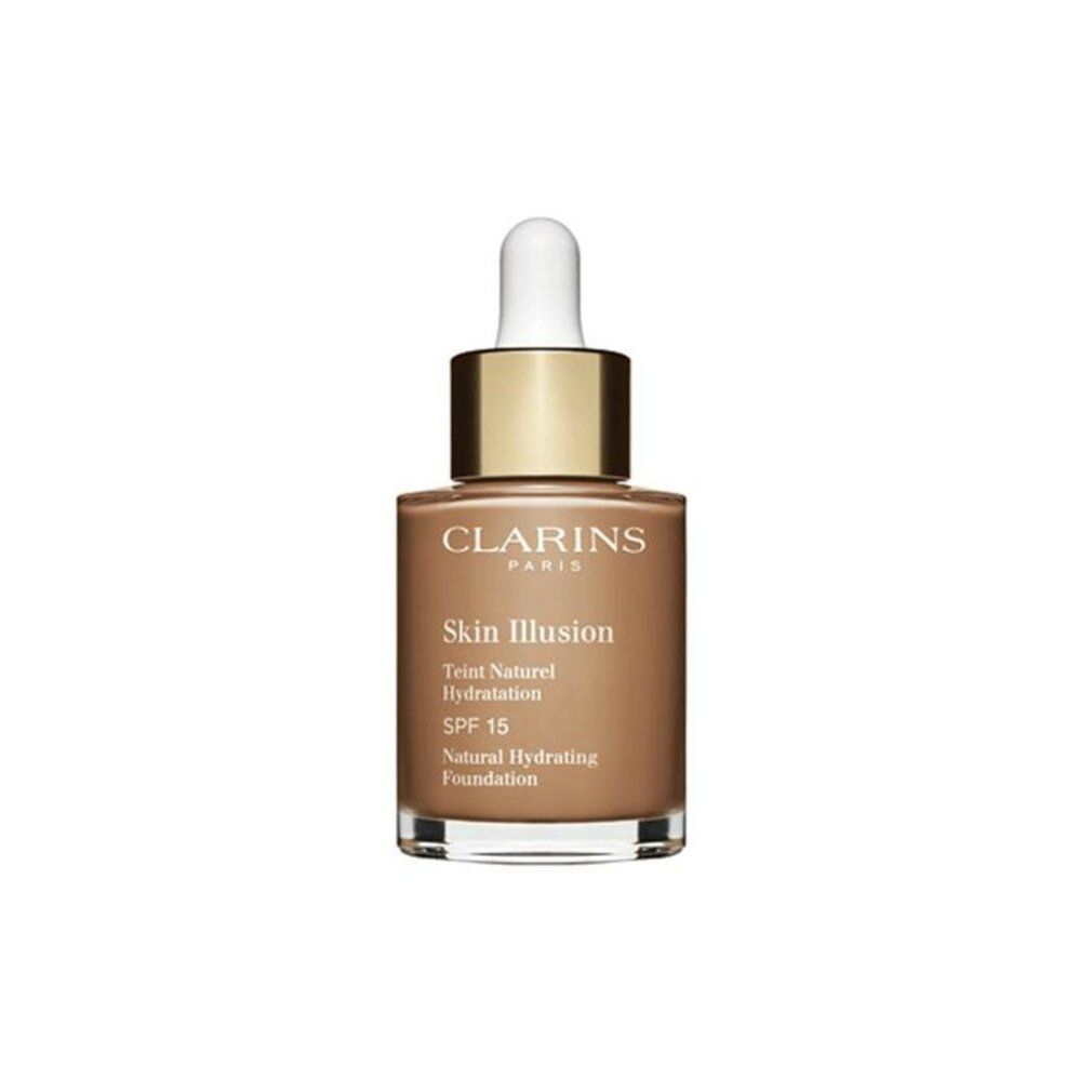 Fondotinta Clarins Skin Illusion. Liquido marrone in flacone di vetro con tappo dorato e pipetta. SPF 15.