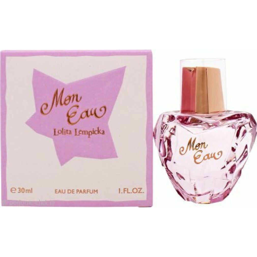 Flacone rosa con tappo dorato e scritta "Mon Eau". Accanto, una scatola con la scritta "Mon Eau" e "Lolita Lempicka".