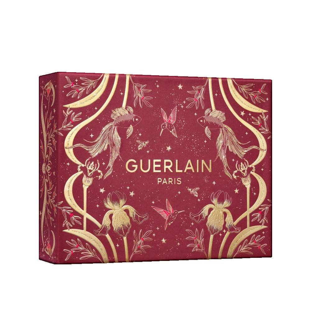 Scatola regalo rossa con decorazioni dorate. Scritta: GUERLAIN PARIS. Decorazioni: pesci, fiori, uccelli. Forma rettangolare.