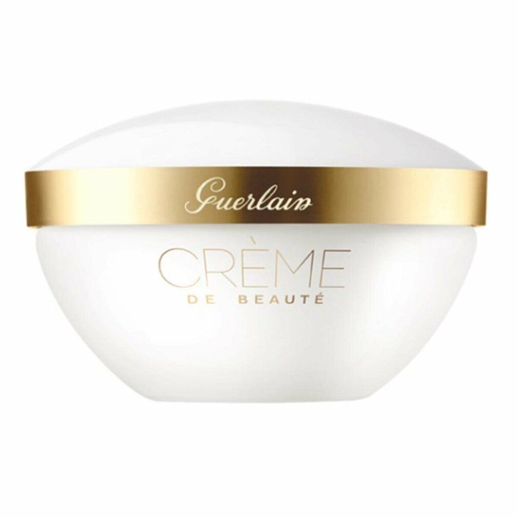 Vaso bianco con bordo dorato e scritta. Il coperchio è bombato. La scritta "Guerlain" è visibile.