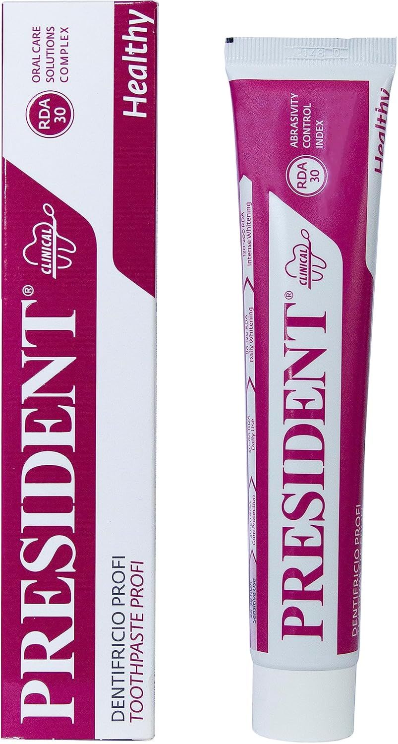 Tubo e scatola di dentifricio. Marchio PRESIDENT, rosa e bianco. RDA 30. Scritta: Healthy, Dentifricio Profi.