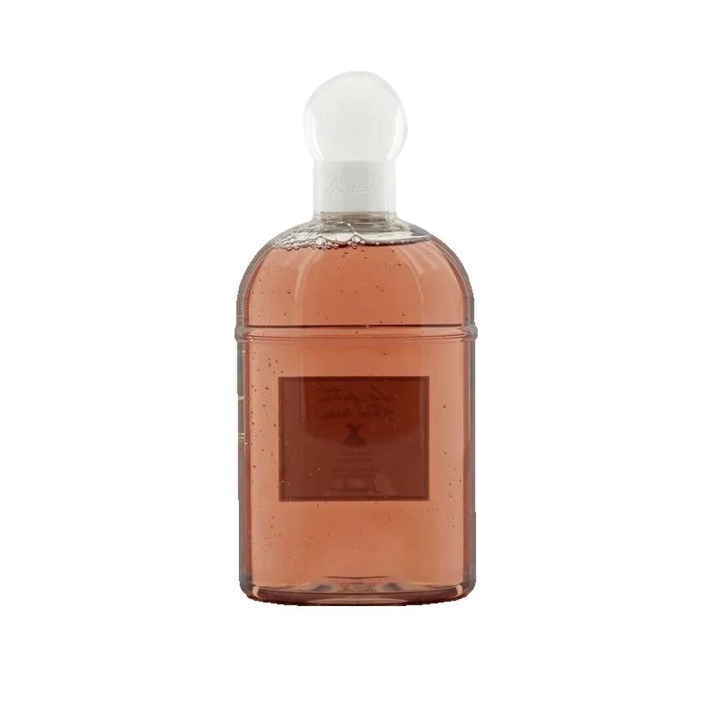 Flacone trasparente con liquido rosa e tappo bianco. Etichetta con testo.