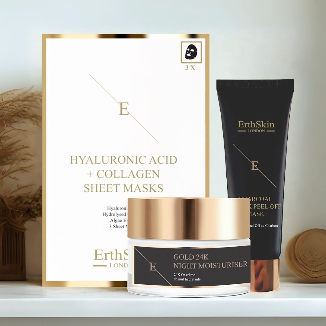 Set con crema notte, maschera viso e maschere al collagene. Vasetto dorato, tubo nero e confezione. ErthSkin London. Su mensola.