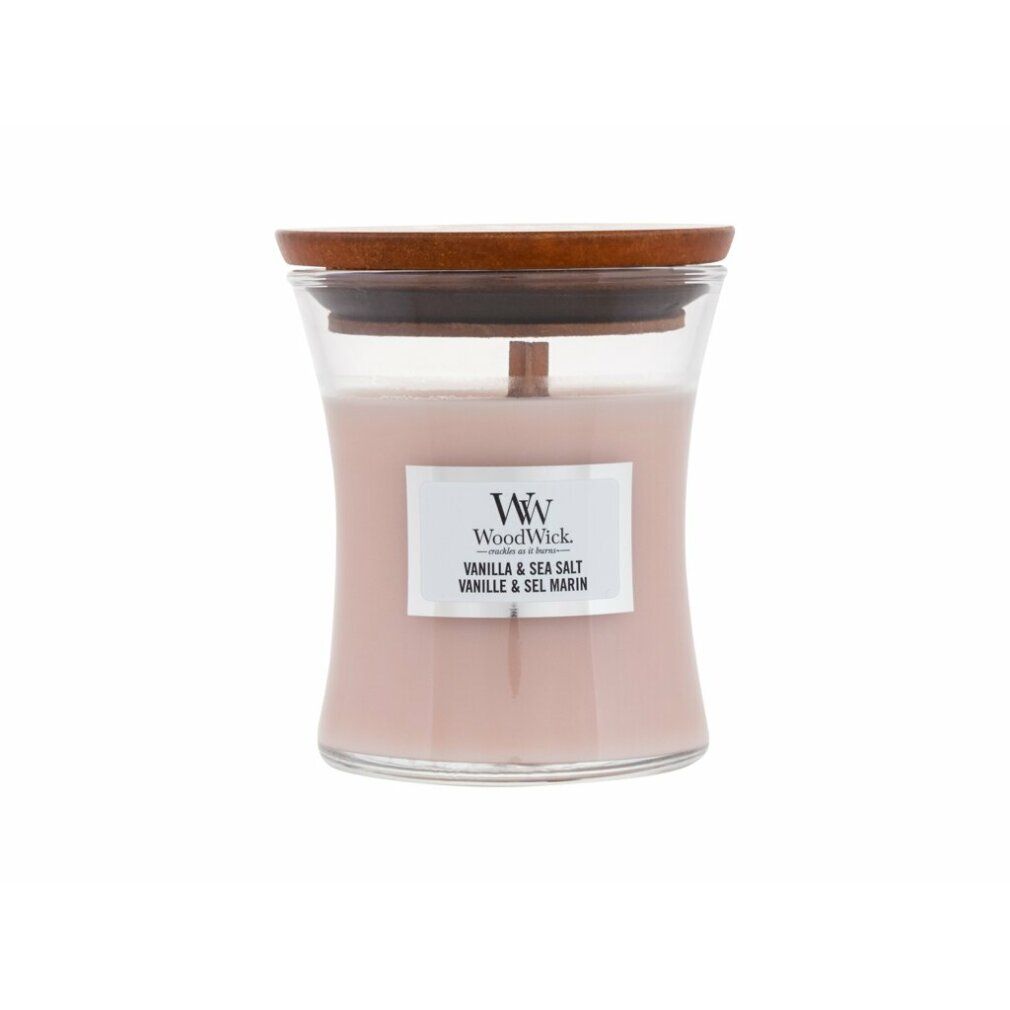 Candela a forma di clessidra con coperchio. Etichetta "Vanilla & Sea Salt".