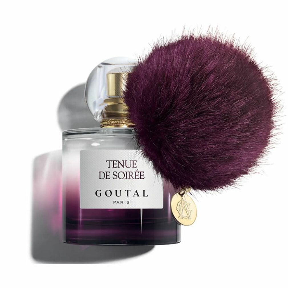 Flacone di profumo con pompon viola. Scritta: Tenue de Soirée, Goutal Paris. Chiusura dorata.