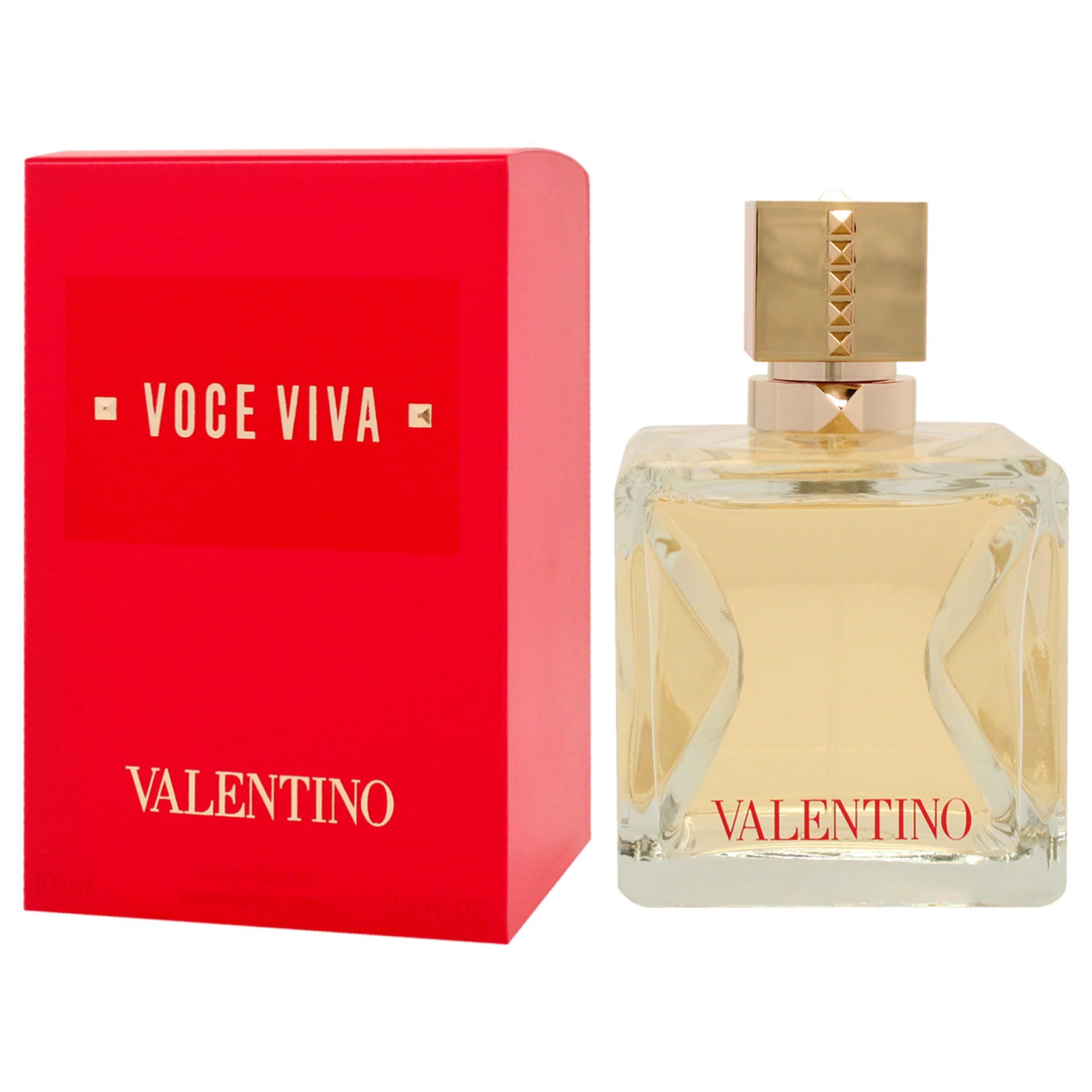 Confezione rossa e flacone di profumo. Flacone con tappo dorato. Scritta "VOICE VIVA" e "VALENTINO".