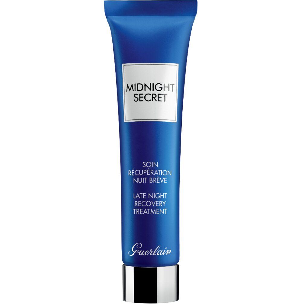 Tubo blu con etichetta bianca. Scritte: MIDNIGHT SECRET, SOIN RÉCUPÉRATION NUIT BRÈVE, LATE NIGHT RECOVERY TREATMENT. Chiusura argentata.
