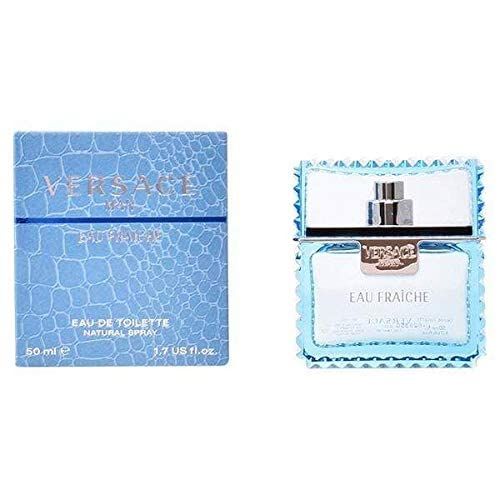Flacone e scatola di profumo. "Versace Man Eau Fraîche" sulla scatola. Flacone con tappo argentato.