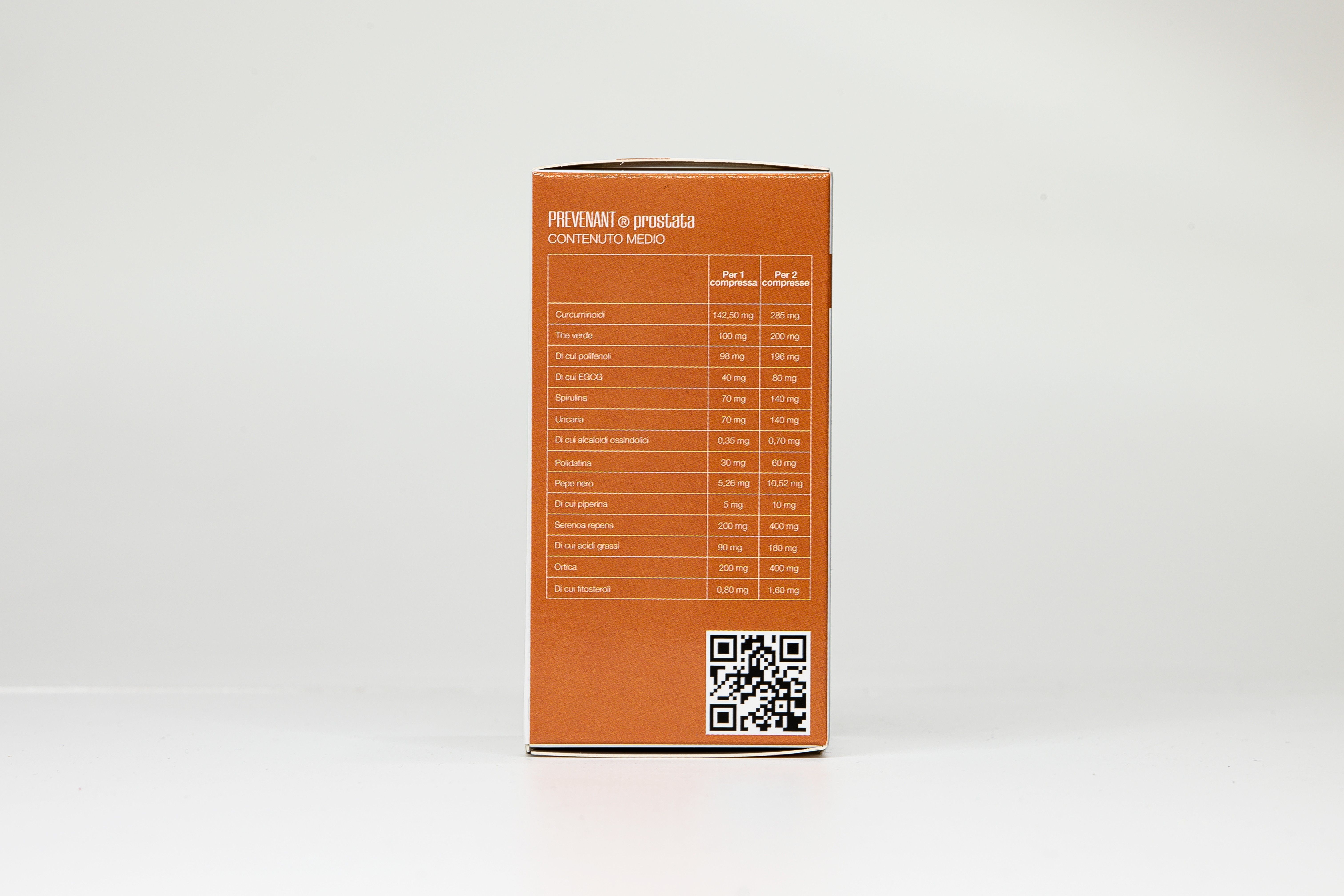 Retro di una scatola arancione. Testo: Tabella nutrizionale, codice QR. PREVENANT Prostata.