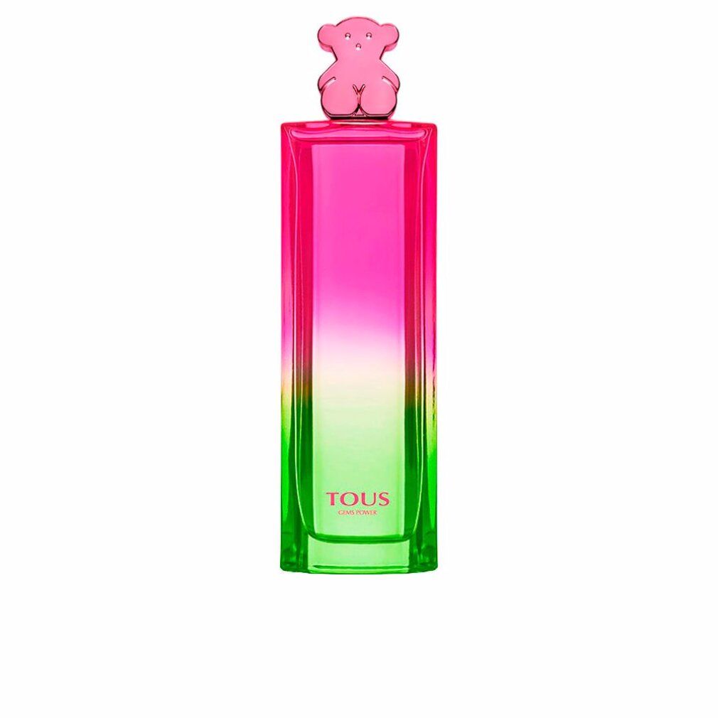Flacone di profumo alto con sfumatura rosa-verde. Tappo orso rosa. Scritta: TOUS GEMS POWER.
