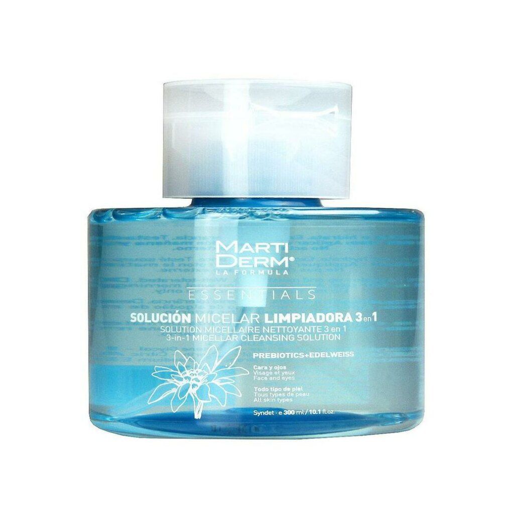 Flacone blu con tappo bianco. Scritta: Marti Derm Essentials, Solución Micelar Limpiadora 3 en 1. Con motivo floreale.