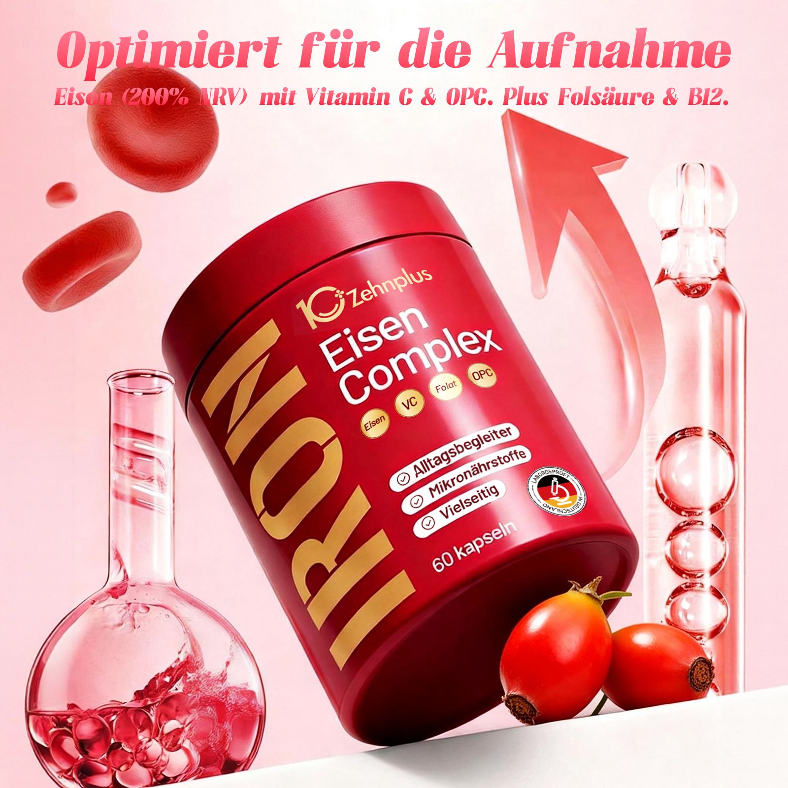 Barattolo rosso con scritta "zehnplus Eisen Complex", 60 capsule. Due bacche di rosa canina accanto.