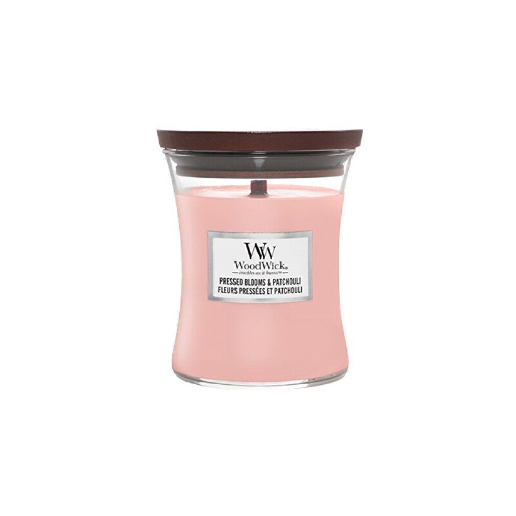 Candela con stoppino in legno e coperchio. Cera rosa in contenitore di vetro. Etichetta con nome e logo.