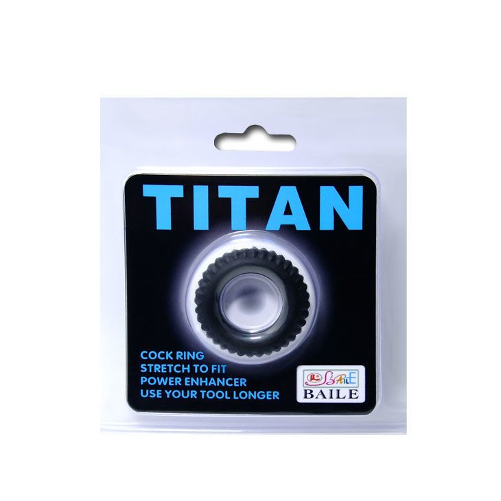 Confezione con anello fallico nero. Testo: TITAN, COCK RING, STRETCH TO FIT, POWER ENHANCER.