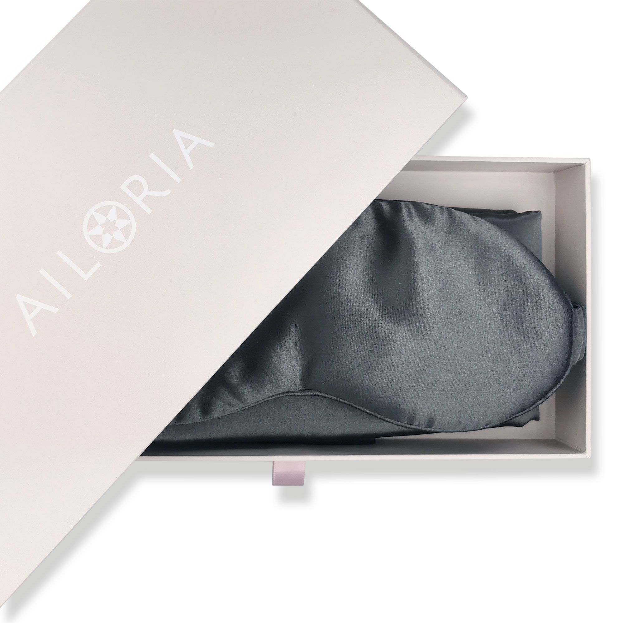 Maschera per dormire in seta grigia in una scatola regalo rosa con logo 'AILORIA'.