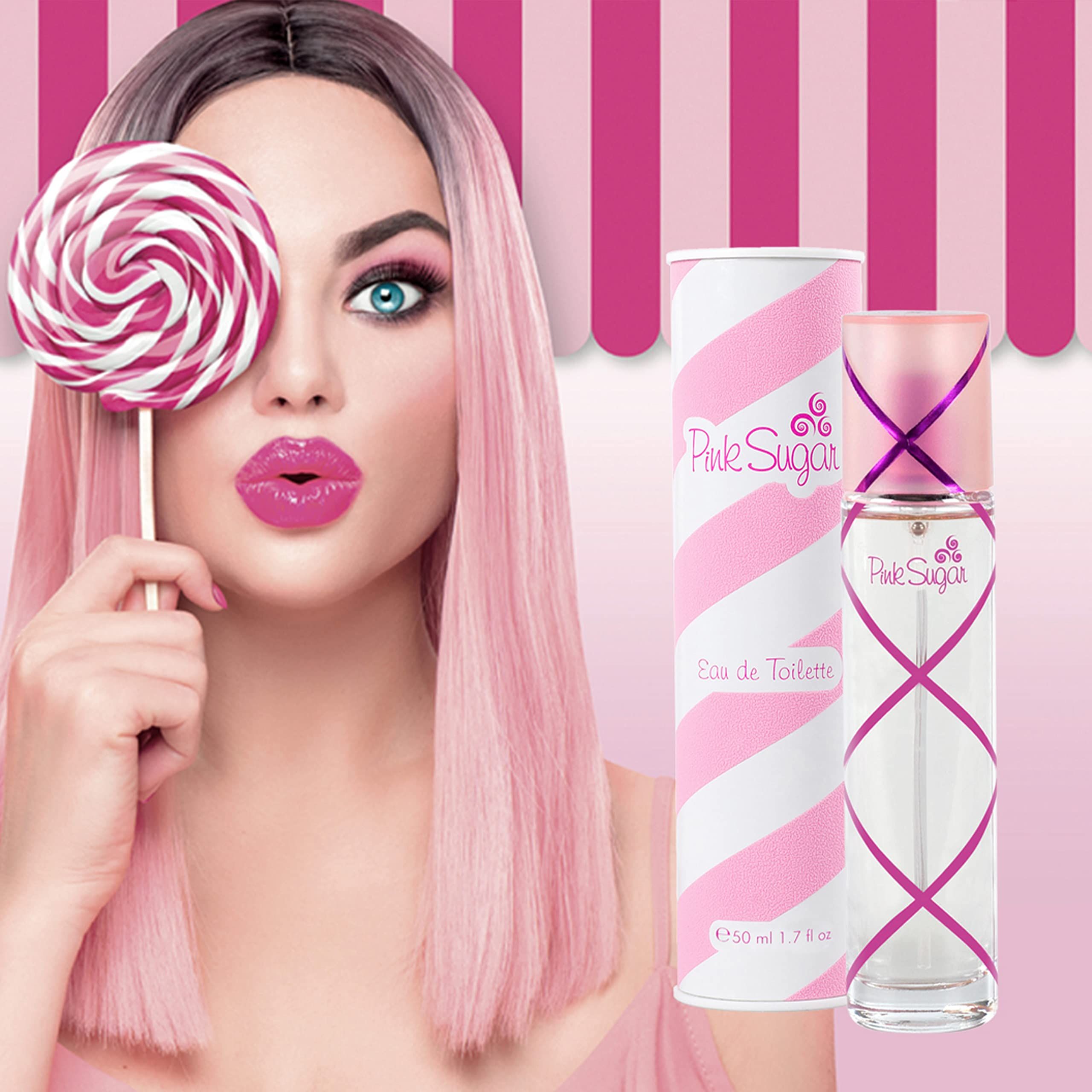 Donna con capelli rosa e lecca lecca. Flacone di profumo e confezione a righe rosa e bianche.