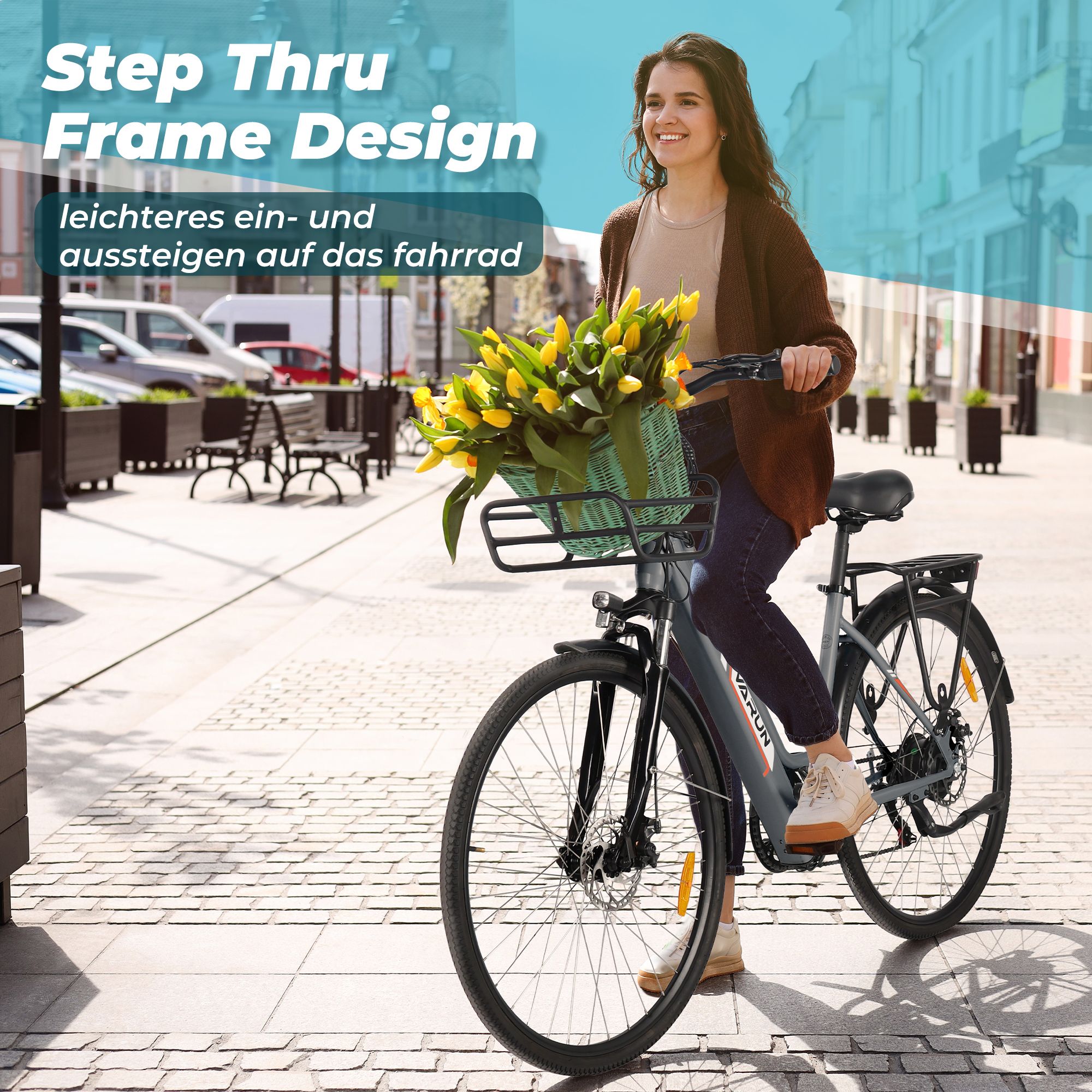Donna in sella a e-bike con cesto di fiori gialli. Testo: Step Thru Frame Design, facile salita e discesa.