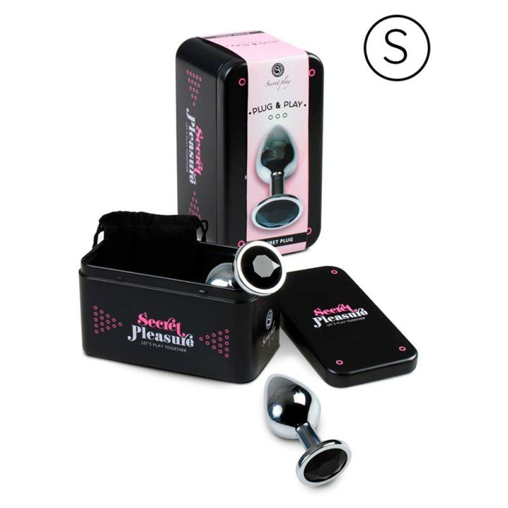 Confezione del prodotto con plug anale. Scatola nera con nome e logo del prodotto. Piccolo sacchetto nero e carta inclusi.