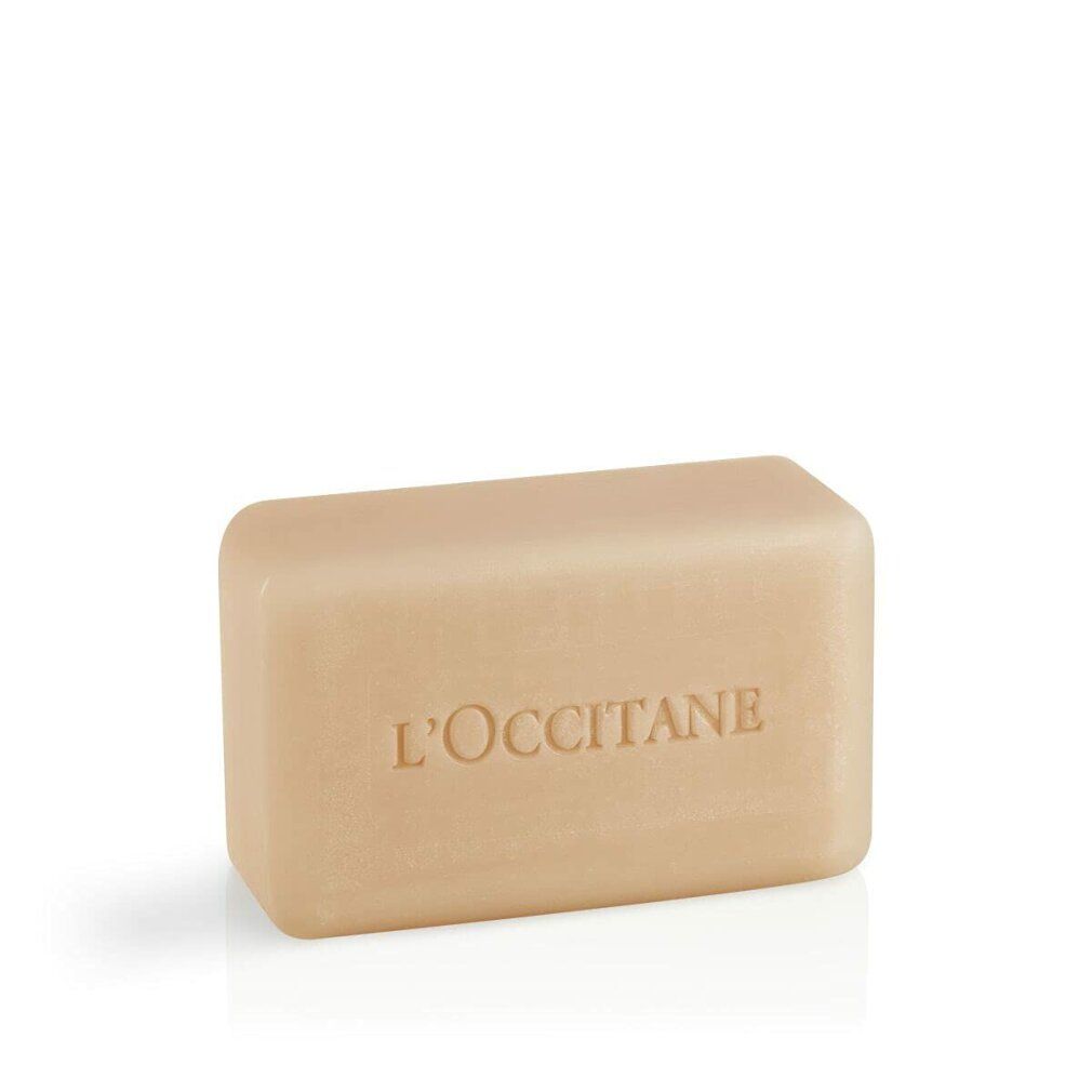Sapone beige rettangolare con bordi arrotondati. Inciso: L'OCCITANE.