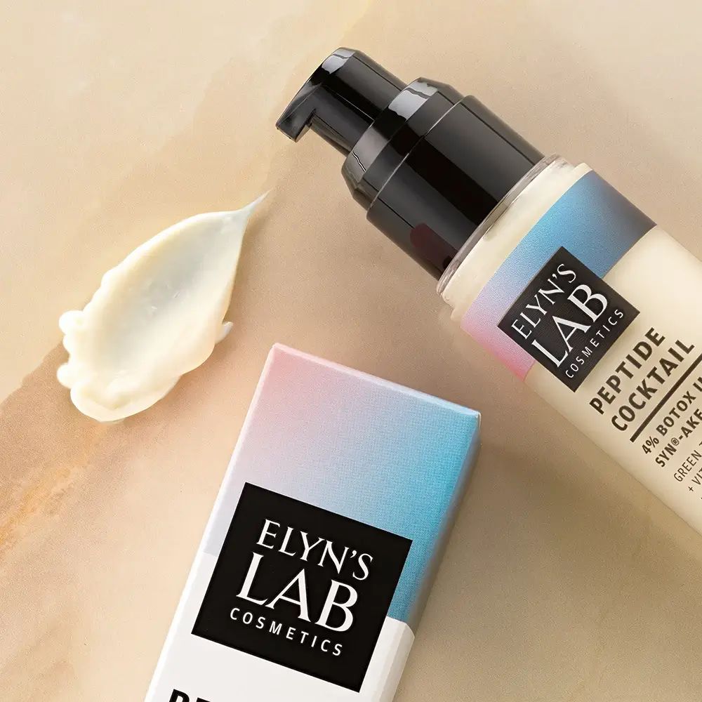 Crema e confezione Elyn's Lab. Scritta: Peptide Cocktail, 4% Syn-Ake. Macchia di crema accanto.