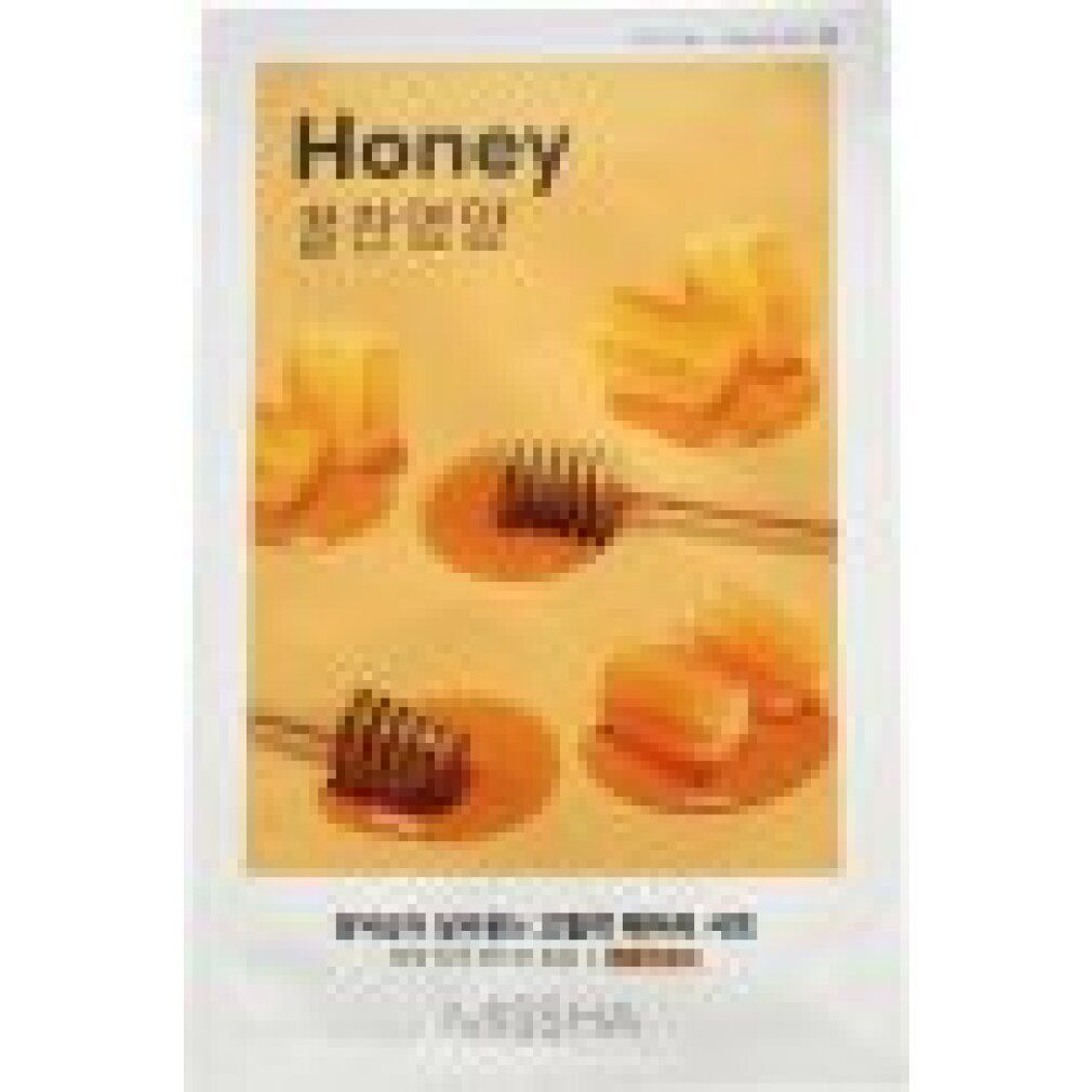 Maschera viso al miele. Confezione con motivi a nido d'ape e cucchiai di miele. Scritta "Honey" e "MISSHA".