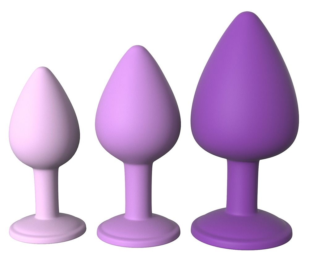 Tre plug anali di dimensioni piccole, medie e grandi, in tonalità viola e lavanda.