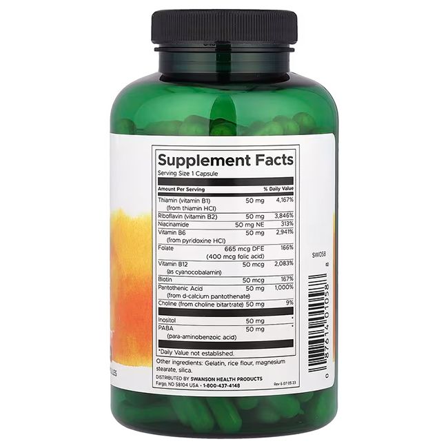 Flacone verde con etichetta bianca. Informazioni nutrizionali. Contiene tiamina, riboflavina, niacina, B12, acido folico, ecc.