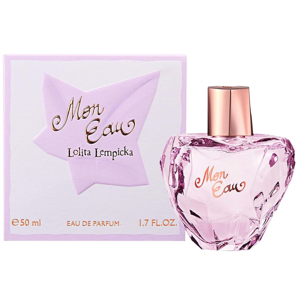 Flacone rosa con tappo dorato e scatola. Scritta "Mon Eau" e "Lolita Lempicka".