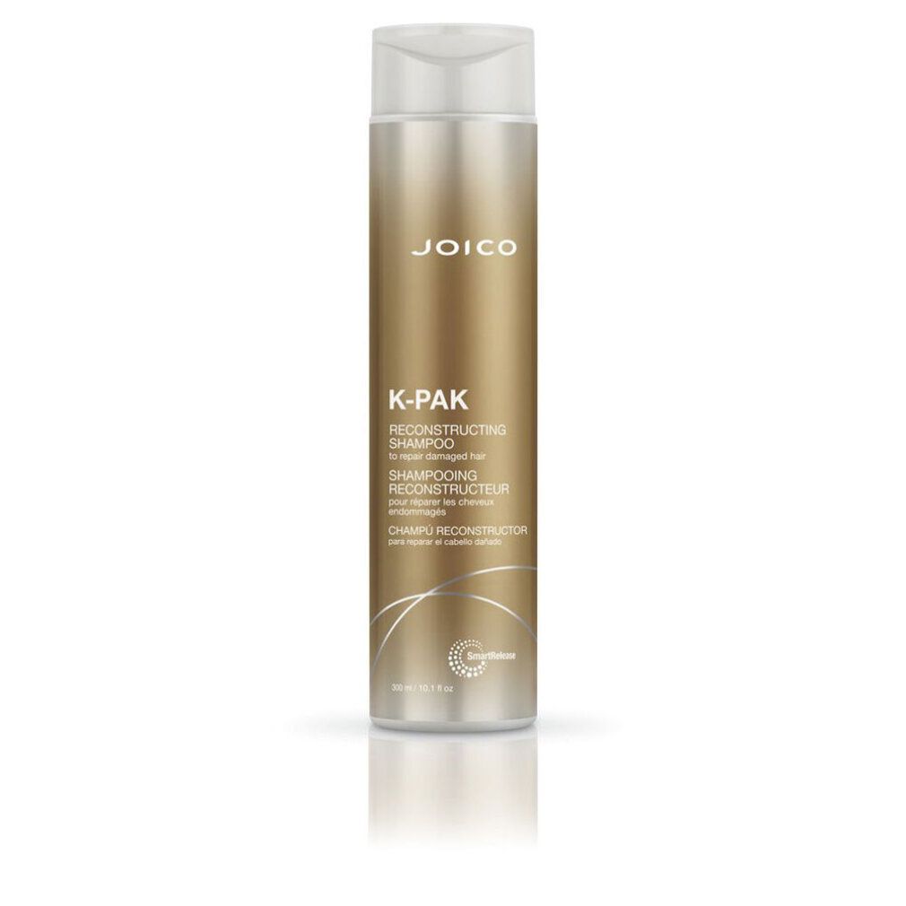 Flacone Joico K-Pak Shampoo. Oro e bianco. Scritte: K-Pak, Reconstructing Shampoo.