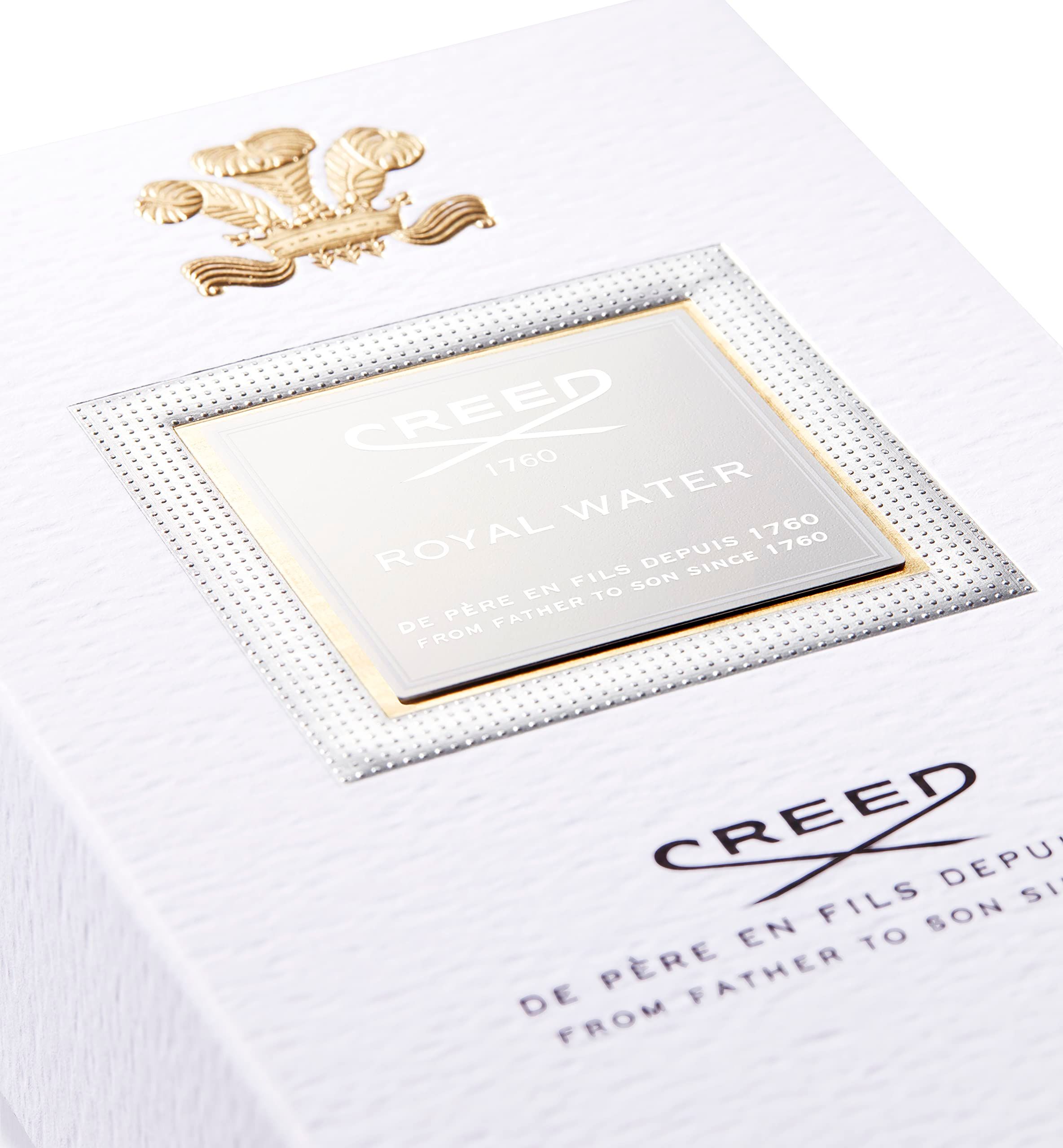 Scatola bianca con stemma dorato ed etichetta "CREED ROYAL WATER".