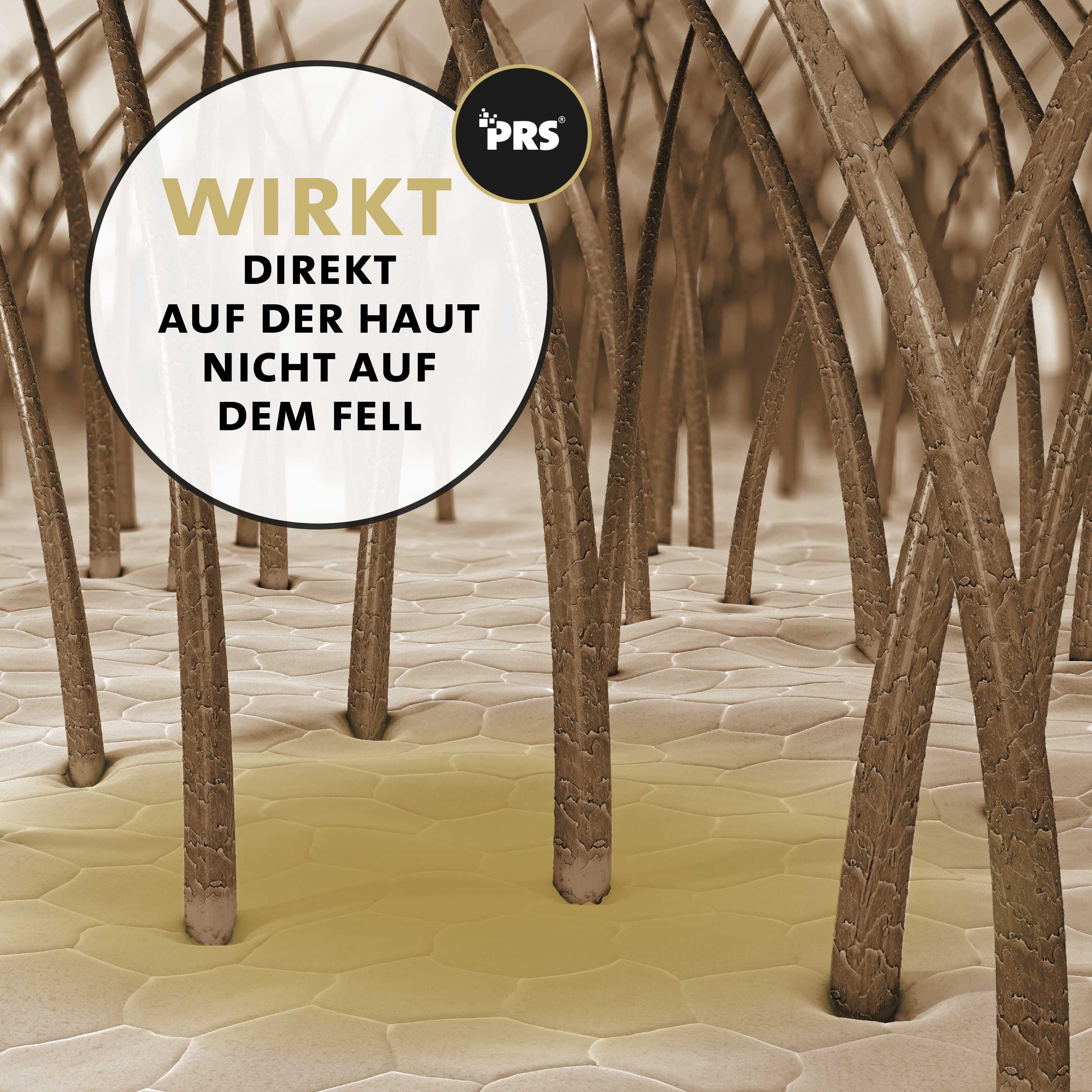 Primo piano dei peli del cane. Testo: Agisce direttamente sulla pelle, non sul pelo. Liquido giallo sulla pelle.