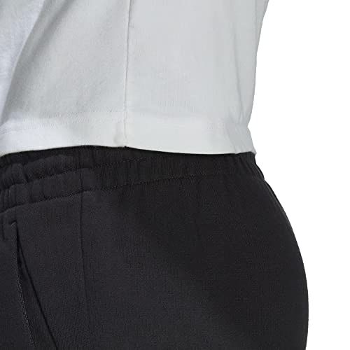 Primo piano sulla vita di un pantalone Adidas nero con logo.