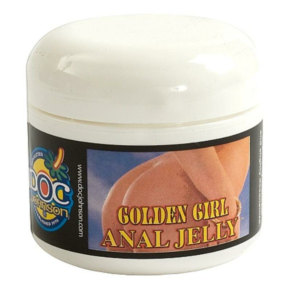 Contenitore con etichetta. Scritta: Golden Girl Anal Jelly. Marchio Doc Johnson. Immagine di un fondoschiena.
