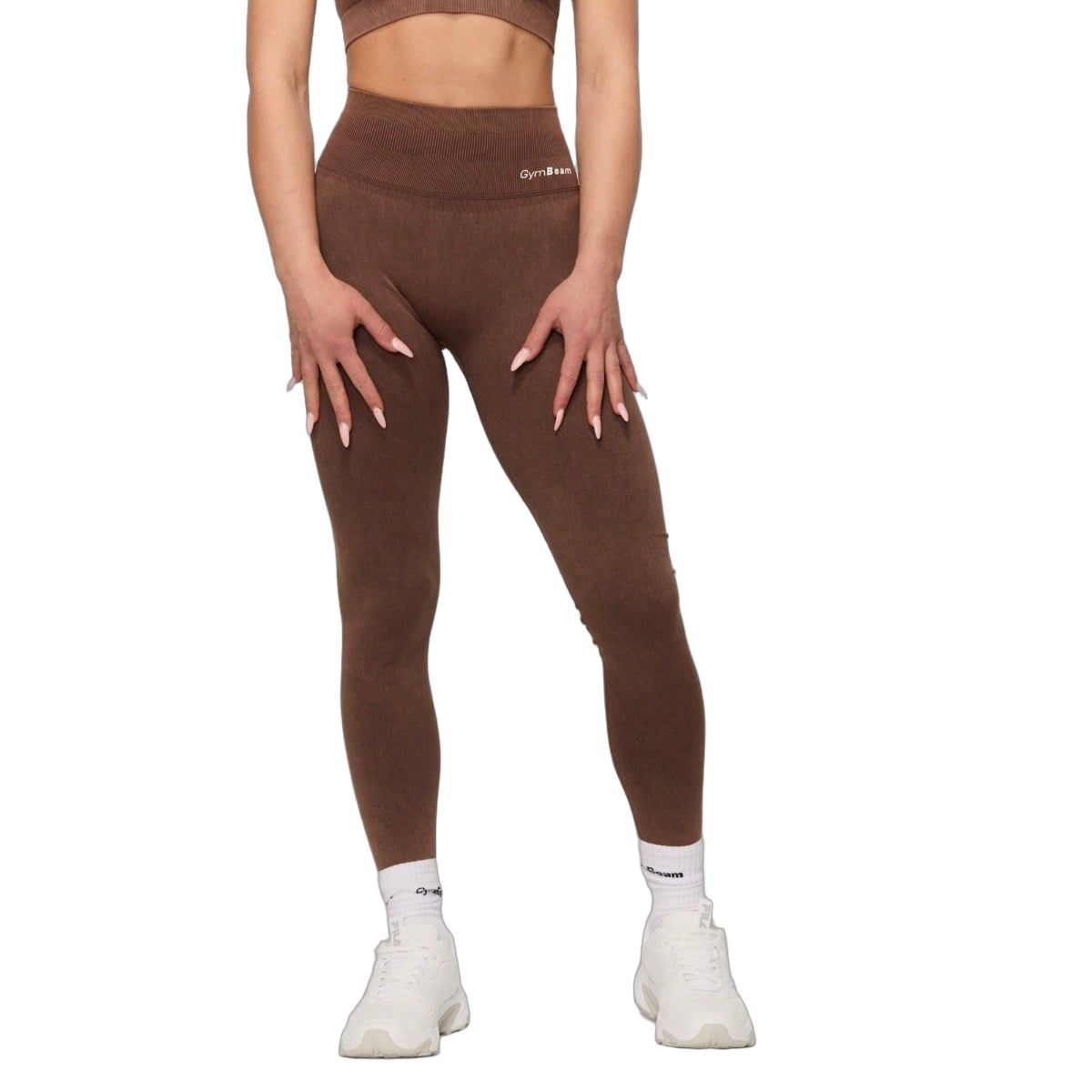 Leggings marroni senza cuciture a vita alta con logo discreto sul davanti.